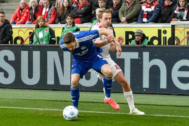 from left in duel Janik Bachmann Schalke 14 Mathias Olesen Koeln 47 09 02 2025 Soccer 1 FC Koeln vs FC Schalke 04, Rheinenergiestadion, Koeln, DFB DFL REGULATIONS PROHIBIT ANY USE OF PHOTOGRAPHS AS IMAGE SEQUENCES AND OR QUASI VIDEO Copyright: xpepphotox xSaschaxWeizx pep00321, pep_20250209_hm_0224