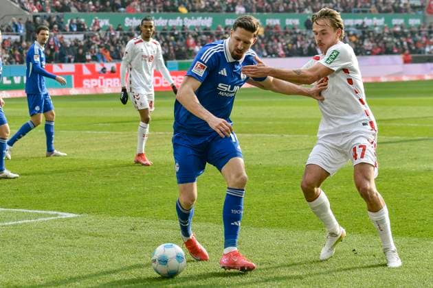 from left in duel Janik Bachmann Schalke 14 Mathias Olesen Koeln 47 09 02 2025 Soccer 1 FC Koeln vs FC Schalke 04, Rheinenergiestadion, Koeln, DFB DFL REGULATIONS PROHIBIT ANY USE OF PHOTOGRAPHS AS IMAGE SEQUENCES AND OR QUASI VIDEO Copyright: xpepphotox xSaschaxWeizx pep00321, pep_20250209_hm_0271