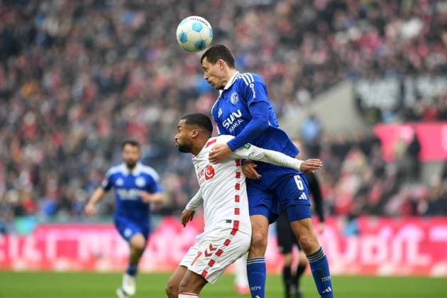 Linton Maina 1 FC Koeln and Ron Schallenberg FC Schalke 04 in a duel during the 2 Bundesliga match between 1 FC Koeln and FC Schalke 04 at RheinEnergieStadion on February 09, 2025 in Cologne, Germany Photo by Ralf Treese DeFodi Images Linton Maina 1 FC Koeln and Ron Schallenberg FC Schalke 04 battle for the ball during the 2 Bundesliga match between 1 FC Koeln and FC Schalke 04 at RheinEnergieStadion on February 9, 2025 in Cologne, Germany Photo by Ralf Treese DeFodi Images DFB DFL REGULATIONS PROHIBIT ANY USE OF PHOTOGRAPHS AS IMAGE SEQUENCES AND OR QUASI VIDEO Photo by Ralf Treese DeFodi Images Defodi 521 KOES0420250209 047 Defodi-521 DFB DFL REGULATIONS PROHIBIT ANY USE OF PHOTOGRAPHS AS IMAGE SEQUENCES AND OR QUASI-VIDEO.