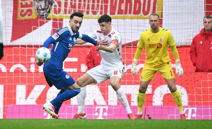 Football, Bundesliga, Germany, Men, Season 2024 2025, Matchday 21, Rhein Energie Stadion Köln, 1 FC Köln FC Schalke 04 1 0 Kenan Karaman S04 , Eric Martel KOE , Marvin Schwäbe KOE Action