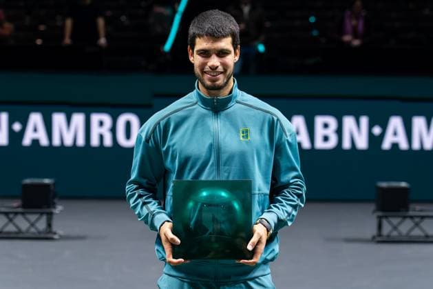 2025-02-09 ABN AMRO Open Day Seven ROTTERDAM, NETHERLANDS - FEBRUARY 9: Carlos Alcaraz of Spain celebrates his sides win with trophy during Day Seven of the ABN AMRO Open at Rotterdam Ahoy on February 9, 2025 in Rotterdam, Netherlands. (Photo by Joris Verwijst BSR Agency) Rotterdam Netherlands Content not available for redistribution in The Netherlands directly or indirectly through any third parties. Copyright: xBSRxAgencyx