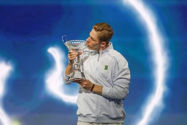 FRISCO, TX - FEBRUARY 09: Denis Shapovalov (CAN) kisses the trophy after winning the Dallas Open on February 9, 2025 at Ford Center at The Star in Frisco, TX. (Photo by George Walker Icon Sportswire) TENNIS: FEB 09 Dallas Open EDITORIAL USE ONLY Icon250209003