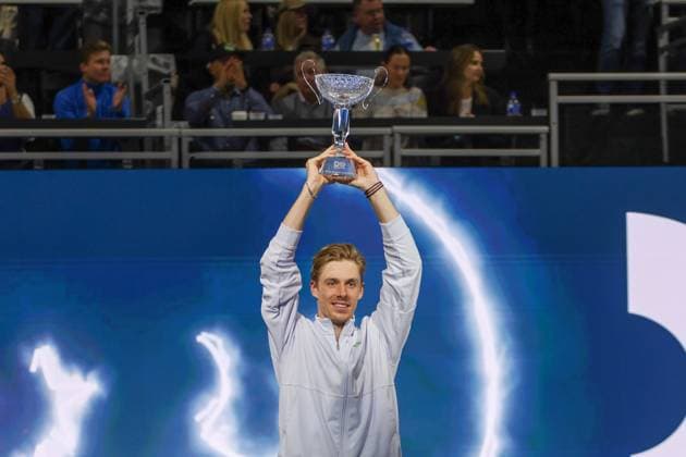 FRISCO, TX - FEBRUARY 09: Denis Shapovalov (CAN) raises the trophy after winning the Dallas Open on February 9, 2025 at Ford Center at The Star in Frisco, TX. (Photo by George Walker Icon Sportswire) TENNIS: FEB 09 Dallas Open EDITORIAL USE ONLY Icon250209006