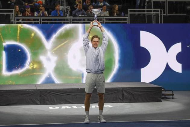 FRISCO, TX - FEBRUARY 09: Denis Shapovalov (CAN) raises the trophy after winning the Dallas Open on February 9, 2025 at Ford Center at The Star in Frisco, TX. (Photo by George Walker Icon Sportswire) TENNIS: FEB 09 Dallas Open EDITORIAL USE ONLY Icon250209008
