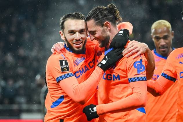 February 9, 2025, Angers, France, France: Adrien RABIOT of Marseille celebrate his goal with Amine GOUIRI of Marseille during the Ligue 1 match between Angers SCO and Olympique de Marseille (OM) at Raymond Kopa Stadium on February 09, 2025 in Angers, France. Angers France - ZUMAm308 20250209_zsp_m308_008 Copyright: xMatthieuxMirvillex