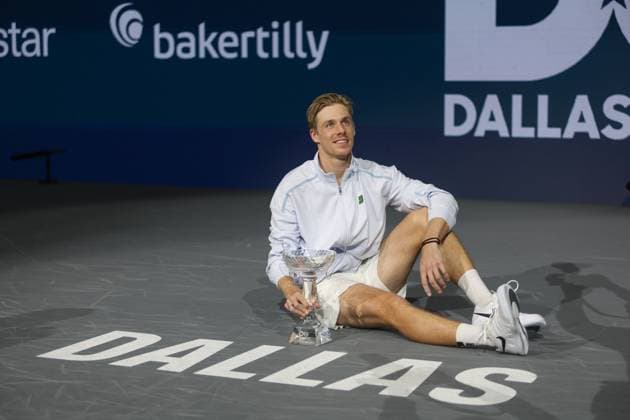 FRISCO, TX - FEBRUARY 09: Denis Shapovalov (CAN) poses with the trophy after winning the Dallas Open on February 9, 2025 at Ford Center at The Star in Frisco, TX. (Photo by George Walker Icon Sportswire) TENNIS: FEB 09 Dallas Open EDITORIAL USE ONLY Icon250209036