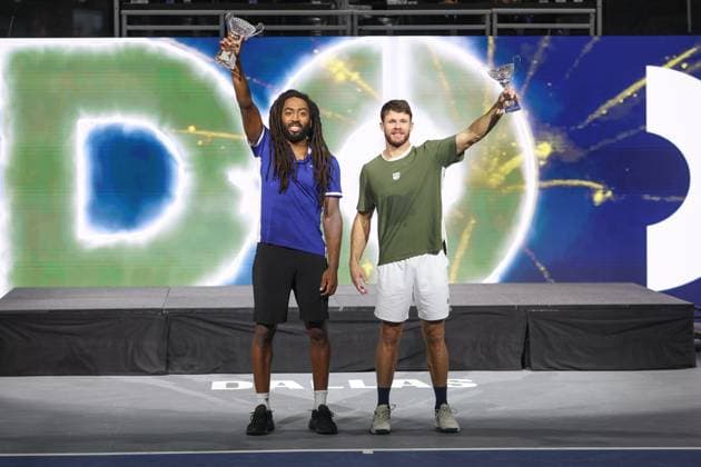 FRISCO, TX - FEBRUARY 09: Evan King (USA) and Christian Harrison (USA) raise the trophies after winning the Doubles Final of the Dallas Open on February 9, 2025 at Ford Center at The Star in Frisco, TX. (Photo by George Walker Icon Sportswire) TENNIS: FEB 09 Dallas Open EDITORIAL USE ONLY Icon250209040