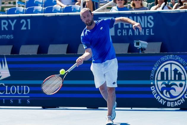 DELRAY BEACH, FL - FEBRUARY 09: Xavier Malisse (BEL) hits a forehand during the Legends Event match against Murphy Jensen (USA) and Ryan Harrison (USA) at the Delray Beach Open on Sunday February 9, 2025, at the Delray Beach Stadium & Tennis Center in Delray Beach, Florida.(Photo by Chris Arjoon Icon Sportswire) TENNIS: FEB 09 Delray Beach Open EDITORIAL USE ONLY Icon250209001126