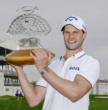 Golf: Phoenix Open Thomas Detry of Belgium poses with the victor s trophy after winning the Phoenix Open golf tournament on Feb. 9, 2025, at TPC Scottsdale in Scottsdale, Arizona.  A14AA0004124990P