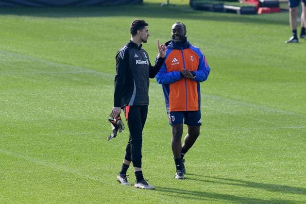 Mattia Perin of Juventus FC and Alfred Dossou staff of Juventus FC during the 2024 2025 Champions League training at JTC Continassa on February 10, 2025 in Turin, Italy - ph Giuliano Marchisciano  Copyright: xGiulianoxMarchisciano IPAxSportx xipa-agency.netx xx IPA_53887006 IPA_Agency_IPA53887006