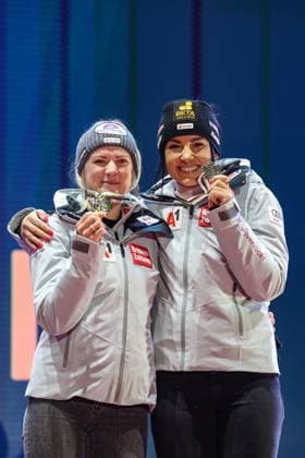 ALPINE SKIING - FIS Ski WC Saalbach 2025 SAALBACH,AUSTRIA,11.FEB.25 - ALPINE SKIING - FIS Alpine World Ski Championships Saalbach 2025, team combined, ladies, medal plaza, award ceremony. Image shows Katharina Truppe and Stephanie Venier (AUT). Keywords: medal.  GEPAxpictures xHaraldxSteiner