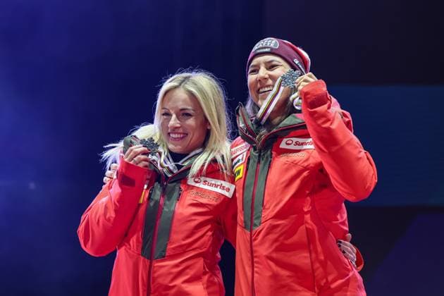ALPINE SKIING - FIS Ski WC Saalbach 2025 SAALBACH,AUSTRIA,11.FEB.25 - ALPINE SKIING - FIS Alpine World Ski Championships Saalbach 2025, team combined, ladies, medal plaza, award ceremony. Image shows Lara Gut-Behrami and Wendy Holdener (SUI). Keywords: medal.  GEPAxpictures xHaraldxSteiner