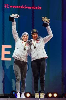 ALPINE SKIING - FIS Ski WC Saalbach 2025 SAALBACH,AUSTRIA,11.FEB.25 - ALPINE SKIING - FIS Alpine World Ski Championships Saalbach 2025, team combined, ladies, medal plaza, award ceremony. Image shows the rejoicing of Katharina Truppe and Stephanie Venier (AUT). Keywords: medal, trophy.  GEPAxpictures xHaraldxSteiner