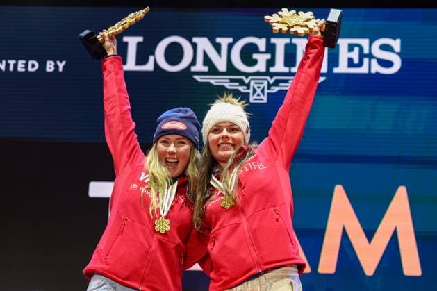 ALPINE SKIING - FIS Ski WC Saalbach 2025 SAALBACH,AUSTRIA,11.FEB.25 - ALPINE SKIING - FIS Alpine World Ski Championships Saalbach 2025, team combined, ladies, medal plaza, award ceremony. Image shows the rejoicing of Mikaela Shiffrin and Breezy Johnson (USA). Keywords: medal, trophy.  GEPAxpictures xHaraldxSteiner