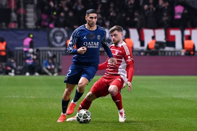 FOOTBALL : Brest vs PSG - Ligue des Champions - 11 02 2025 Achraf Hakimi ( 2 - PSG ) and Hugo MAGNETTI ( 8 - Brest ) during the UEFA Champions League match between Stade Brestois 29 and Paris Saint Germain at Stade de Roudourou on February 11, 2025 in Guingamp, France. ( Photo by Dante Badano PsnewZ ) - GuingampFrance  Copyright: xDantexBadanox