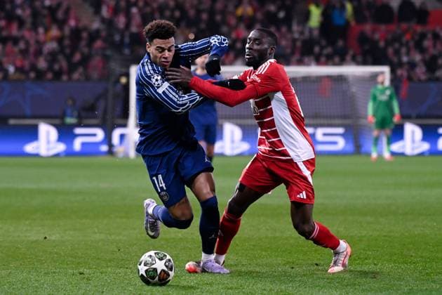 FOOTBALL : Brest vs PSG - Ligue des Champions - 11 02 2025 Desire Doue ( 14 - PSG ) and Jeremy LE DOUARON ( 22 - Brest ) during the UEFA Champions League match between Stade Brestois 29 and Paris Saint Germain at Stade de Roudourou on February 11, 2025 in Guingamp, France. ( Photo by Dante Badano PsnewZ ) - GuingampFrance  Copyright: xDantexBadanox