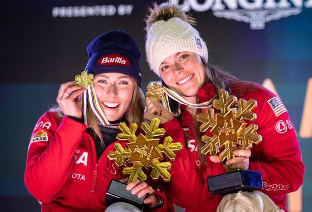 ALPINE SKIING - FIS Ski WC Saalbach 2025 SAALBACH,AUSTRIA,11.FEB.25 - ALPINE SKIING - FIS Alpine World Ski Championships Saalbach 2025, team combined, ladies, medal plaza, award ceremony. Image shows Mikaela Shiffrin and Breezy Johnson (USA). Keywords: medals and trophies.  GEPAxpictures xHaraldxSteiner