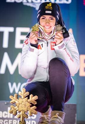 ALPINE SKIING - FIS Ski WC Saalbach 2025 SAALBACH,AUSTRIA,11.FEB.25 - ALPINE SKIING - FIS Alpine World Ski Championships Saalbach 2025, team combined, ladies, medal plaza, award ceremony. Image shows Stephanie Venier (AUT). Keywords: medals and trophy.  GEPAxpictures xHaraldxSteiner