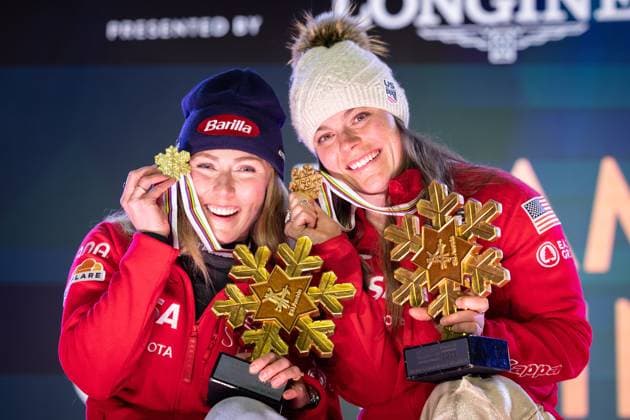 ALPINE SKIING - FIS Ski WC Saalbach 2025 SAALBACH,AUSTRIA,11.FEB.25 - ALPINE SKIING - FIS Alpine World Ski Championships Saalbach 2025, team combined, ladies, medal plaza, award ceremony. Image shows Mikaela Shiffrin and Breezy Johnson (USA). Keywords: medals and trophies.  GEPAxpictures xHaraldxSteiner