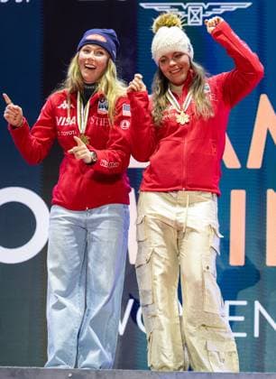 ALPINE SKIING - FIS Ski WC Saalbach 2025 SAALBACH,AUSTRIA,11.FEB.25 - ALPINE SKIING - FIS Alpine World Ski Championships Saalbach 2025, team combined, ladies, medal plaza, award ceremony. Image shows Mikaela Shiffrin and Breezy Johnson (USA). Keywords: medals.  GEPAxpictures xHaraldxSteiner