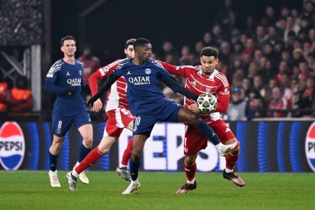 FOOTBALL : Brest vs PSG - Ligue des Champions - 11 02 2025 Ousmane DEMBELE ( 10 - PSG ) and Kenny Lala ( 7 - Brest ) during the UEFA Champions League match between Stade Brestois 29 and Paris Saint Germain at Stade de Roudourou on February 11, 2025 in Guingamp, France. ( Photo by Dante Badano PsnewZ ) - GuingampFrance  Copyright: xDantexBadanox