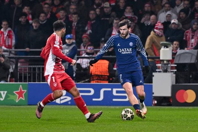 FOOTBALL : Brest vs PSG - Ligue des Champions - 11 02 2025 Khvicha Kvaratskhelia ( 7 - PSG ) and Kenny Lala ( 7 - Brest ) during the UEFA Champions League match between Stade Brestois 29 and Paris Saint Germain at Stade de Roudourou on February 11, 2025 in Guingamp, France. ( Photo by Dante Badano PsnewZ ) - GuingampFrance  Copyright: xDantexBadanox