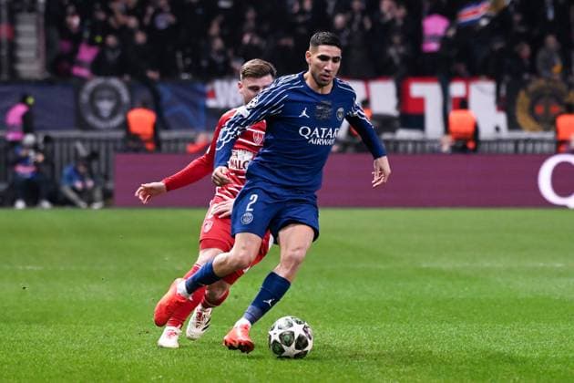 FOOTBALL : Brest vs PSG - Ligue des Champions - 11 02 2025 Achraf Hakimi ( 2 - PSG ) and Hugo MAGNETTI ( 8 - Brest ) during the UEFA Champions League match between Stade Brestois 29 and Paris Saint Germain at Stade de Roudourou on February 11, 2025 in Guingamp, France. ( Photo by Dante Badano PsnewZ ) - GuingampFrance  Copyright: xDantexBadanox
