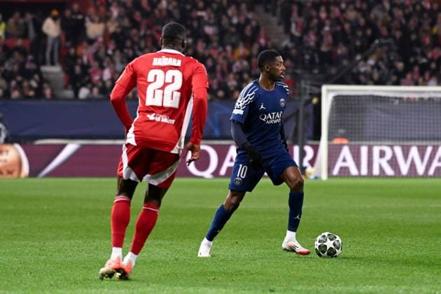FOOTBALL : Brest vs PSG - Ligue des Champions - 11 02 2025 Ousmane DEMBELE ( 10 - PSG ) and Jeremy LE DOUARON ( 22 - Brest ) during the UEFA Champions League match between Stade Brestois 29 and Paris Saint Germain at Stade de Roudourou on February 11, 2025 in Guingamp, France. ( Photo by Dante Badano PsnewZ ) - GuingampFrance  Copyright: xDantexBadanox