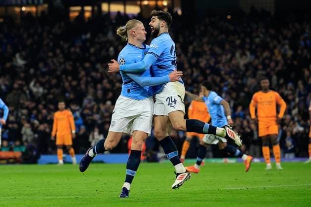 Sport Themen der Woche KW07 Sport Bilder des Tages Manchester City v Real Madrid Champions League 11 02 2025. Erling Haaland (9) of Manchester City celebrates scoring with Josko Gvardiol (24) of Manchester City to make it 1-0 during the Champions League match between Manchester City and Real Madrid at the Etihad Stadium, Manchester, England on 11 February 2025. Manchester Etihad Stadium Manchester England Editorial use only , Copyright: xConorxMolloyx PSI-21439-0024