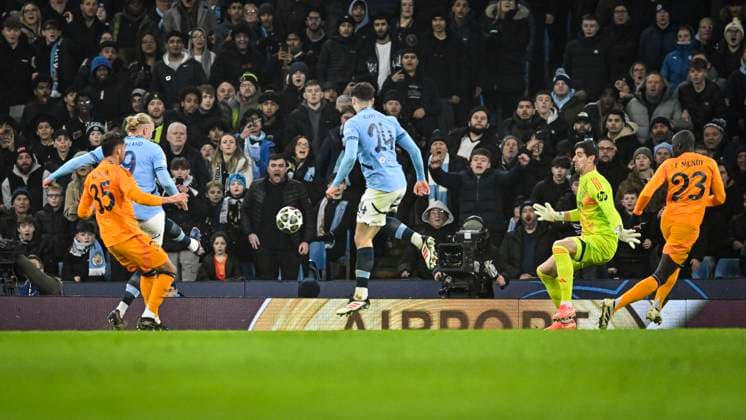 11th February 2025; Etihad Stadium, Manchester, England; UEFA Champions League Play Off Round 1 Football, Manchester City versus Real Madrid; Erling Haaland of Manchester City shoots and scores in the 19th minute for 1-0  ActionPlus12749760 GodfreyxPitt