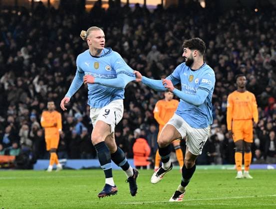 Manchester, England, 11th February 2025. Manchester City™s Erling Haaland celebrates scoring his sides opening goal during the UEFA Champions League match at the Etihad Stadium, Manchester. Picture credit should read: Cody Froggatt Sportimage EDITORIAL USE ONLY. No use with unauthorised audio, video, data, fixture lists, club league logos or live services. Online in-match use limited to 120 images, no video emulation. No use in betting, games or single club league player publications. SPI_CF_043_Man_City_Real_Madrid SPI-3675-0081