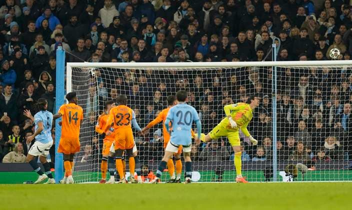 Manchester, England, 11th February 2025. Manchester City™s Nathan Ake hits the bar during the UEFA Champions League match at the Etihad Stadium, Manchester. Picture credit should read: Andrew Yates Sportimage EDITORIAL USE ONLY. No use with unauthorised audio, video, data, fixture lists, club league logos or live services. Online in-match use limited to 120 images, no video emulation. No use in betting, games or single club league player publications. SPI_AY_040_Man_City_Real_Madrid SPI-3675-0101