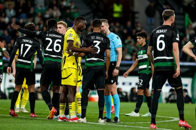 Serhou Guirassy forward of Borussia Dortmund(r) and Jerry St. Juste defender of Sporting CP (m) and Espen Eskas referees during the UEFA Champions League 2024 25 League knockout phase play-offs first leg football match between Sporting CP and Borussia Dortmund at the Jose Alvalade stadium in Lisbon on February 11, 2025. UEFA Champions League - Sporting CP vs Borussia Dortmund (Valter Gouveia SPP) Copyright: xValterxGouveia SPPx spp-en-VaGo-VG_L0307