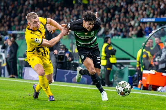 11 02 2025, Football UEFA Champions League, Season 2024 2025, Play Offs, First leg, Sporting CP Lisbon Borussia Dortmuna at Estadio Jose Alvalade in Lisbon Dortmunds Julian Ryerson l and Lisbons Joao Simoes fight for the ball Photo Kirchner Media Thomas Haesler IMPORTANT NOTE In accordance with UEFA regulations, it is prohibited to use or have used photographs taken in the stadium and or of the match in the form of sequential images and or video-like photo series Copyright: xKirchner-Media ThomasxHaeslerx