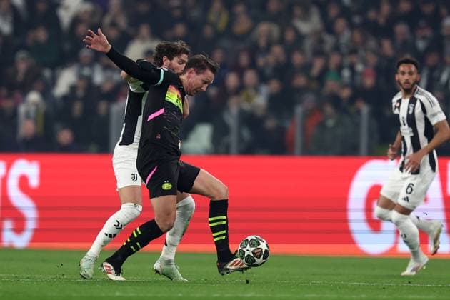 Luuk de Jong (PSV Eindhoven) und Manuel Locatelli (Juventus FC) battle for the ball, UEFA Champions League 2024 25 League Knockout Play-off First Leg, Juventus Turin v PSV, Allianz Stadium, February 11, 2025, Turin, Italy.