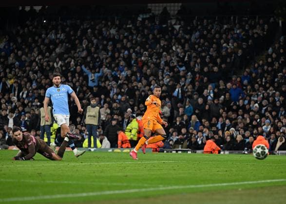 Manchester, England, 11th February 2025. Real Madrid s Kylian Mbappe hits the post during the UEFA Champions League match at the Etihad Stadium, Manchester. Picture credit should read: Cody Froggatt Sportimage EDITORIAL USE ONLY. No use with unauthorised audio, video, data, fixture lists, club league logos or live services. Online in-match use limited to 120 images, no video emulation. No use in betting, games or single club league player publications. SPI_CF_088_Man_City_Real_Madrid SPI-3675-0146