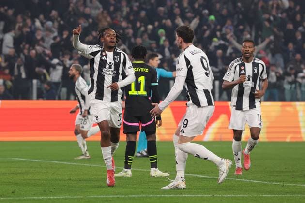 Turin, Italy, 11th February 2025. Samuel Mbangula Tshifunda of Juventus celebrates with team mate Dusan Vlahovic after scoring to give the side a 2-1 lead during the UEFA Champions League match at Allianz Stadium, Turin. Picture credit should read: Jonathan Moscrop Sportimage EDITORIAL USE ONLY. No use with unauthorised audio, video, data, fixture lists, club league logos or live services. Online in-match use limited to 120 images, no video emulation. No use in betting, games or single club league player publications. SPI_040_JM_JUVE_PSV_UCL SPI-3661-0040
