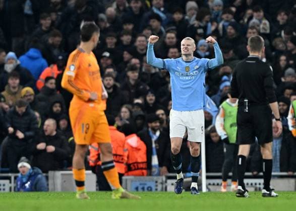 Manchester, England, 11th February 2025. Manchester City™s Erling Haaland celebrates scoring his sides second goal during the UEFA Champions League match at the Etihad Stadium, Manchester. Picture credit should read: Cody Froggatt Sportimage EDITORIAL USE ONLY. No use with unauthorised audio, video, data, fixture lists, club league logos or live services. Online in-match use limited to 120 images, no video emulation. No use in betting, games or single club league player publications. SPI_CF_096_Man_City_Real_Madrid SPI-3675-0164