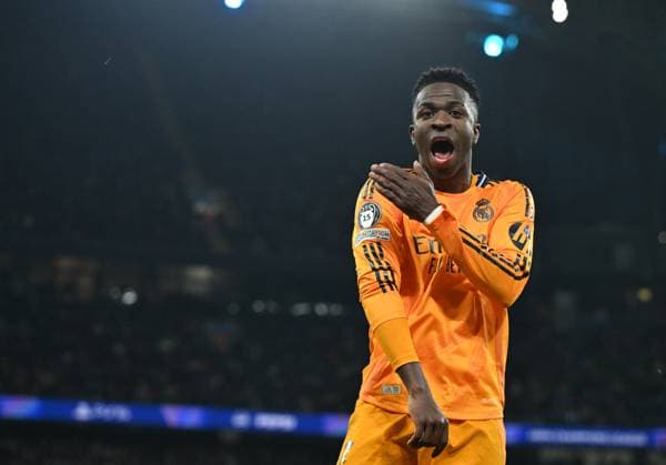 Manchester, England, 11th February 2025. Real Madrid™s Vinicius Junior celebrates his sides third goal during the UEFA Champions League match at the Etihad Stadium, Manchester. Picture credit should read: Cody Froggatt Sportimage EDITORIAL USE ONLY. No use with unauthorised audio, video, data, fixture lists, club league logos or live services. Online in-match use limited to 120 images, no video emulation. No use in betting, games or single club league player publications. SPI_CF_103_Man_City_Real_Madrid SPI-3675-0174