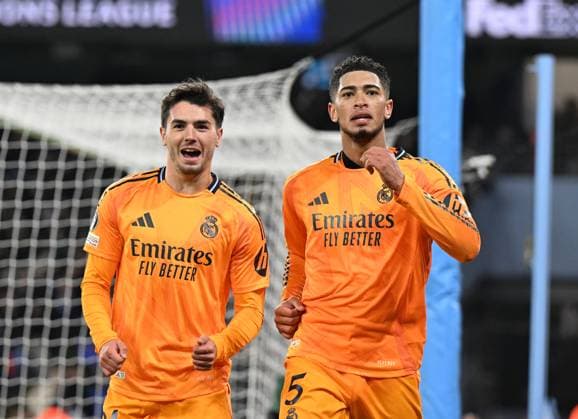 Manchester, England, 11th February 2025. Real Madrid s Jude Bellingham celebrates scoring his sides third goal during the UEFA Champions League match at the Etihad Stadium, Manchester. Picture credit should read: Cody Froggatt Sportimage EDITORIAL USE ONLY. No use with unauthorised audio, video, data, fixture lists, club league logos or live services. Online in-match use limited to 120 images, no video emulation. No use in betting, games or single club league player publications. SPI_CF_131_Man_City_Real_Madrid SPI-3675-0213
