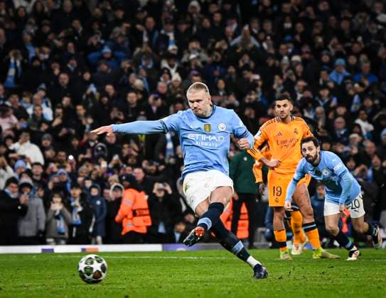 11th February 2025; Etihad Stadium, Manchester, England; UEFA Champions League Play Off Round 1 Football, Manchester City versus Real Madrid; Erling Haaland of Manchester City scores from the penalty spot in the 80th minute for 2-1  ActionPlus12749799 GodfreyxPitt
