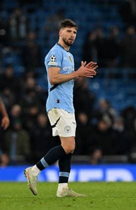 Manchester, England, 11th February 2025. Manchester City s Ruben Dias looks on dejected during the UEFA Champions League match at the Etihad Stadium, Manchester. Picture credit should read: Cody Froggatt Sportimage EDITORIAL USE ONLY. No use with unauthorised audio, video, data, fixture lists, club league logos or live services. Online in-match use limited to 120 images, no video emulation. No use in betting, games or single club league player publications. SPI_CF_121_Man_City_Real_Madrid SPI-3675-0203
