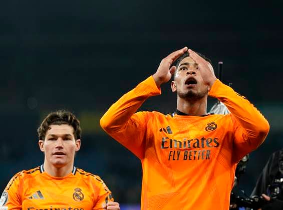 Manchester, England, 11th February 2025. Real Madrid s Jude Bellingham celebrates at the final whistle during the UEFA Champions League match at the Etihad Stadium, Manchester. Picture credit should read: Andrew Yates Sportimage EDITORIAL USE ONLY. No use with unauthorised audio, video, data, fixture lists, club league logos or live services. Online in-match use limited to 120 images, no video emulation. No use in betting, games or single club league player publications. SPI_AY_094_Man_City_Real_Madrid SPI-3675-0225