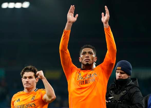 Manchester, England, 11th February 2025. Real Madrid s Jude Bellingham celebrates at the final whistle during the UEFA Champions League match at the Etihad Stadium, Manchester. Picture credit should read: Andrew Yates Sportimage EDITORIAL USE ONLY. No use with unauthorised audio, video, data, fixture lists, club league logos or live services. Online in-match use limited to 120 images, no video emulation. No use in betting, games or single club league player publications. SPI_AY_096_Man_City_Real_Madrid SPI-3675-0227
