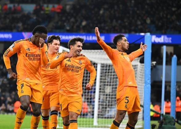 Manchester, England, 11th February 2025. Real Madrid s Jude Bellingham celebrates scoring his sides third goal during the UEFA Champions League match at the Etihad Stadium, Manchester. Picture credit should read: Cody Froggatt Sportimage EDITORIAL USE ONLY. No use with unauthorised audio, video, data, fixture lists, club league logos or live services. Online in-match use limited to 120 images, no video emulation. No use in betting, games or single club league player publications. SPI_CF_0135_Man_City_Real_Madrid SPI-3675-0233