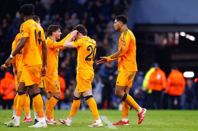 February 11, 2025, Manchester, Manchester, ENGLAND: Jude Bellingham of Real Madrid celebrates a goal with teammates during the UEFA Champions League 2024 25 League Knockout Play-off First Leg match between Manchester City and Real Madrid at Manchester City Stadium on February 11, 2025, in Manchester, England. Manchester ENGLAND - ZUMAa181 20250211_zaa_a181_176 Copyright: xDennisxAgyemanx
