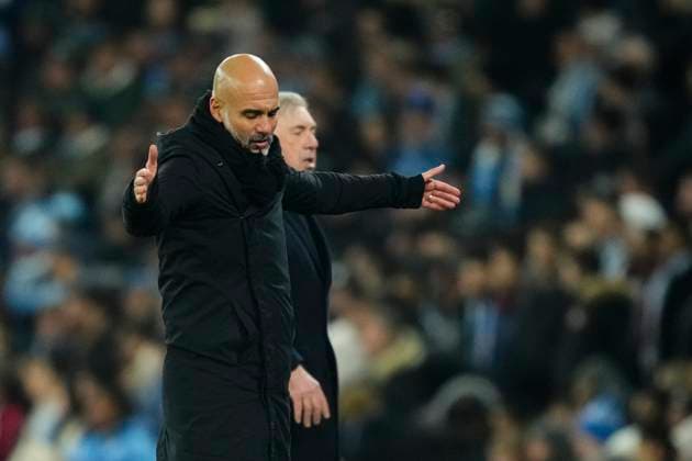 Manchester City v Real Madrid C.F. - UEFA Champions League 2024 25 League Knockout Play-off First Leg Carlo Ancelotti head coach of Real Madrid and Pep Guardiola head coach of Manchester City and Spain reacts during the UEFA Champions League 2024 25 League Knockout Play-off first leg match between Manchester City and Real Madrid C.F. at Manchester City Stadium on February 11, 2025 in Manchester, United Kingdom. Manchester England United Kingdom  Copyright: xJosexBretonx originalFilename:bretonhernandez-manchest250211_npTNA.jpg