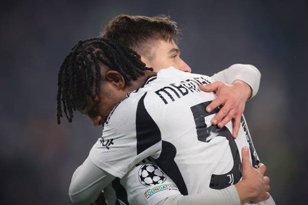 Turin, Italy, 11th February 2025. Samuel Mbangula Tshifunda of Juventus celebrates with team mate Francisco Conceicao after scoring to give the side a 2-1 lead during the UEFA Champions League match at Allianz Stadium, Turin. Picture credit should read: Jonathan Moscrop Sportimage EDITORIAL USE ONLY. No use with unauthorised audio, video, data, fixture lists, club league logos or live services. Online in-match use limited to 120 images, no video emulation. No use in betting, games or single club league player publications. SPI_055_JM_JUVE_PSV_UCL SPI-3661-0055