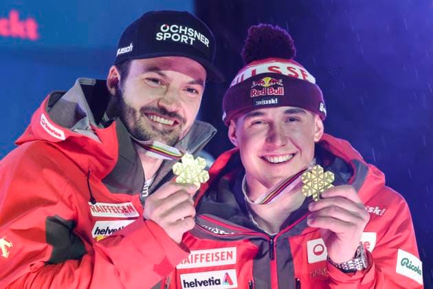 ALPINE SKIING - FIS Ski WC Saalbach 2025 SAALBACH,AUSTRIA,12.FEB.25 - ALPINE SKIING - FIS Alpine World Ski Championships Saalbach 2025, team combined, men, medal plaza, award ceremony. Image shows Loic Meillard (SUI) and Franjo von Allmen (SUI)  GEPAxpictures xWolfgangxGrebien