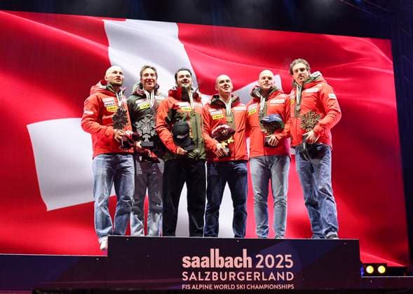 ALPINE SKIING - FIS Ski WC Saalbach 2025 SAALBACH,AUSTRIA,12.FEB.25 - ALPINE SKIING - FIS Alpine World Ski Championships Saalbach 2025, team combined, men, medal plaza, award ceremony. Image shows Alexis Monney (SUI), Tanguy Nef (SUI), Loic Meillard (SUI), Franjo von Allmen (SUI), Stefan Rogentin (SUI) and Marc Rochat (SUI)  GEPAxpictures xWolfgangxGrebien